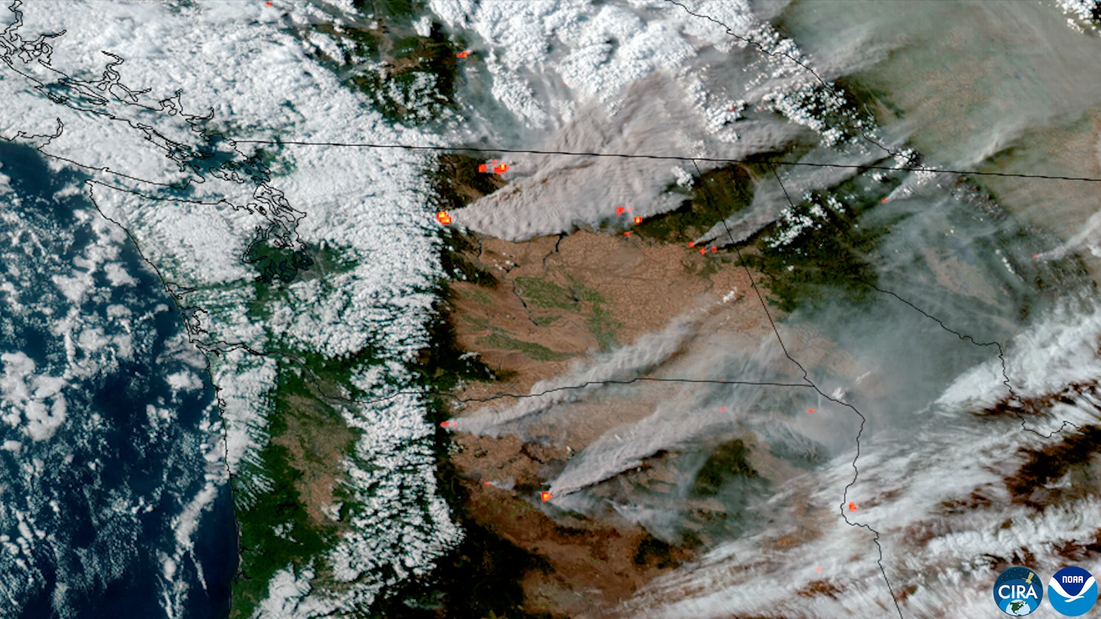 GOES satellite image from 3 August 2026 showing multiple wildfire hotspots and smoke plumes across eastern Washington, with fires encroaching on Spokane