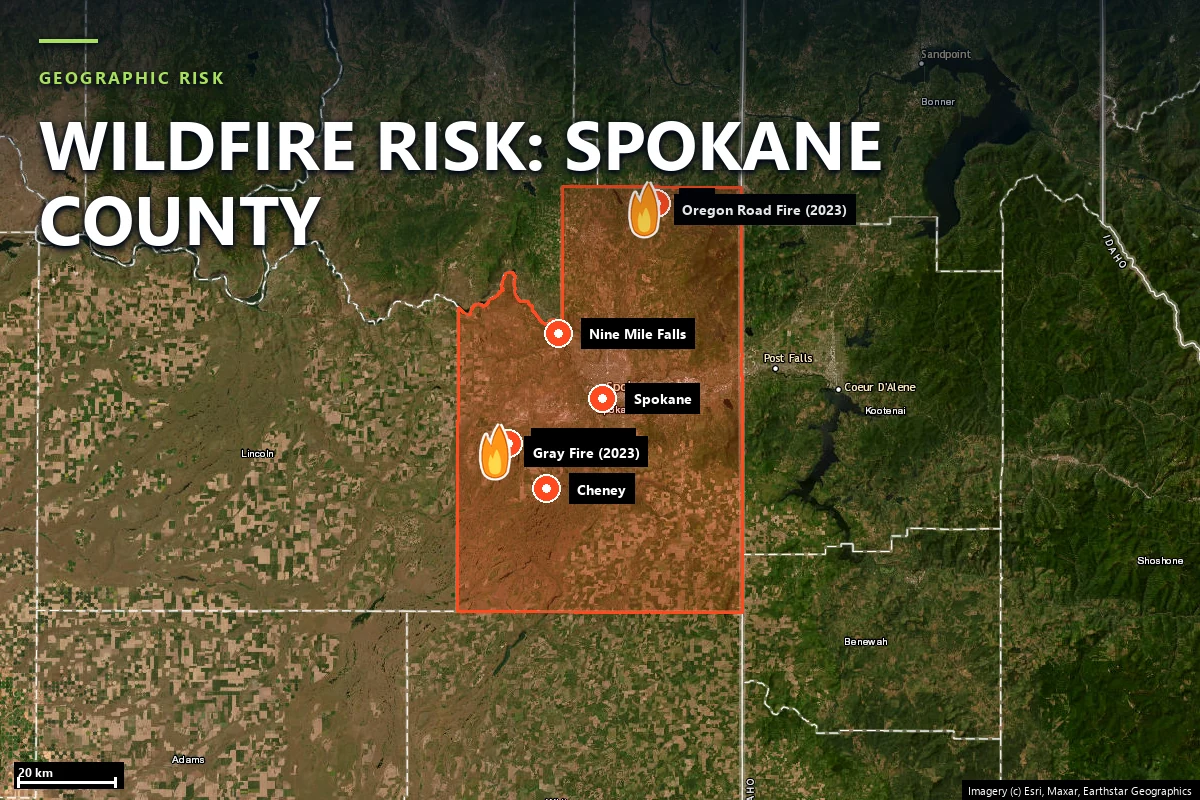 Satellite locator map of Spokane County, Washington, with the county boundary outlined, Medical Lake, Spokane, Cheney, Nine Mile Falls and Elk marked, and flame icons on the 2023 Gray Fire and Oregon Road Fire areas